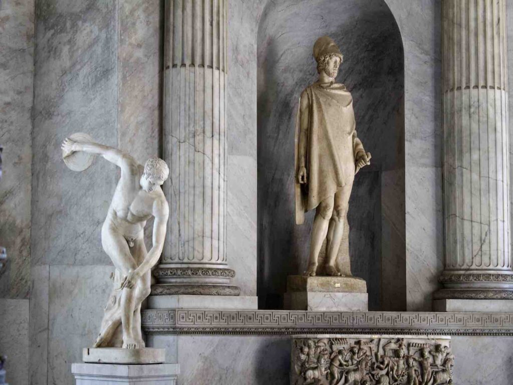 Roman copy of Discus Thrower & Statues inside The Vatican Museum