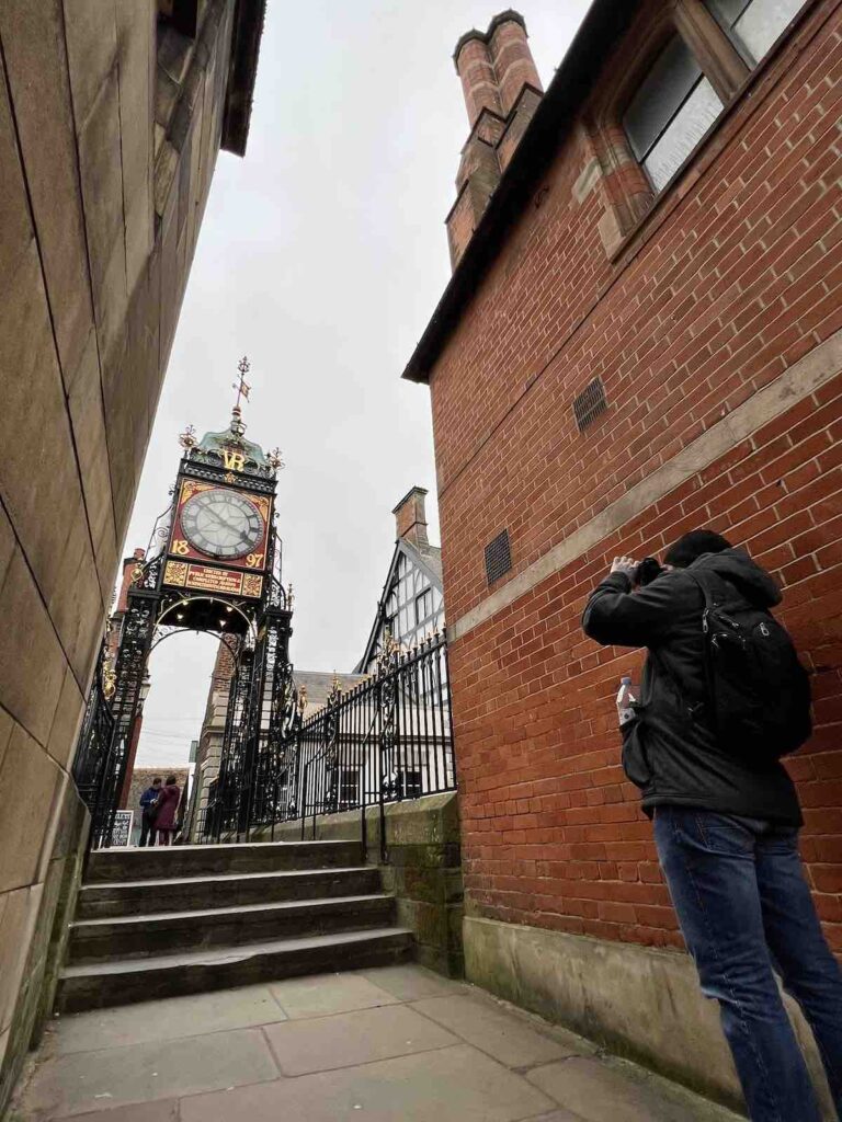 Trevor taking a photo of the Eastgate Clock in Chester 