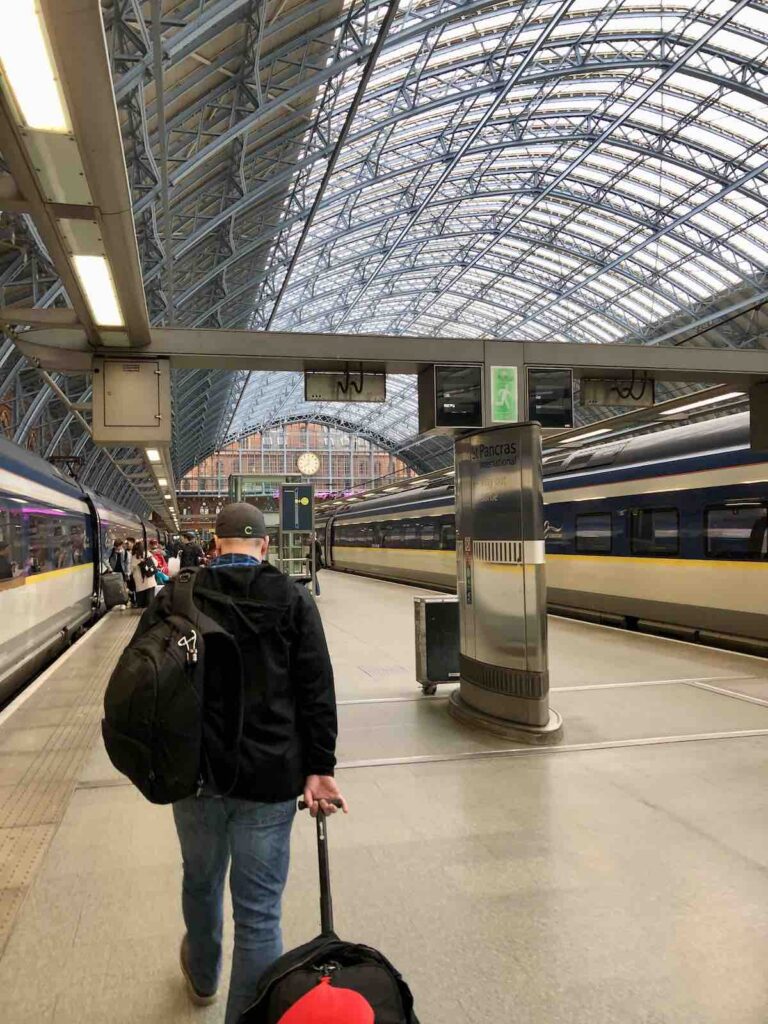 Trevor at the train station with luggage: England Travel Tips 