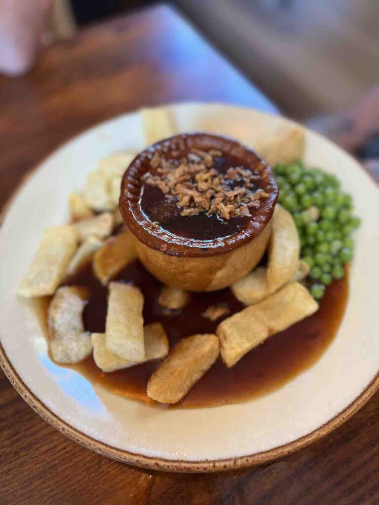 Pie for dinner with chips and peas: England Travel Guide 