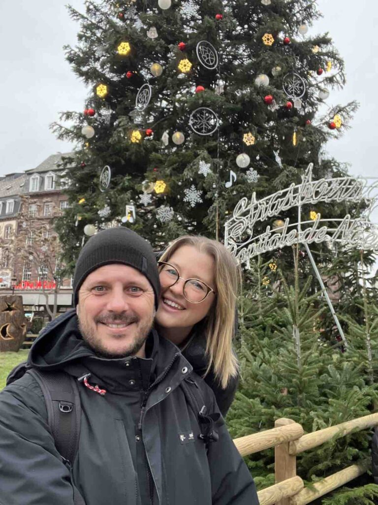 Trevor an Hayley at Place Kleber in Strasbourg France in front of the Big Tree 